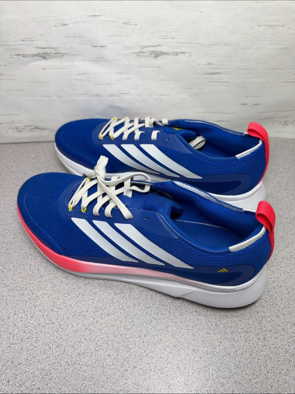 adidas Men’s Blue Athletic Sneakers with White Stripes and Pink Accent